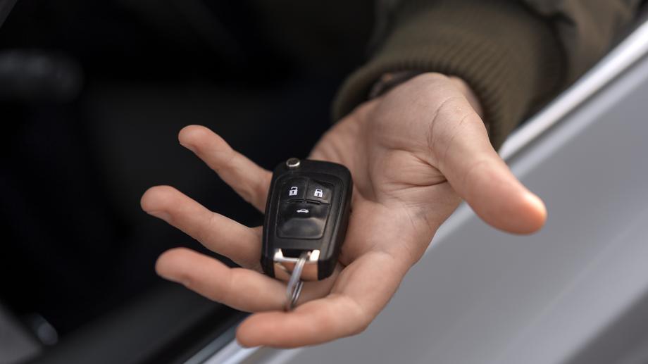 Car key as a symbol of reliable rental and clean car