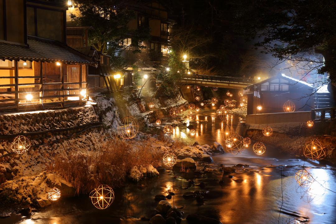 Olde Mistick Village illuminated with holiday lights for a Thanksgiving weekend getaway in Connecticut.