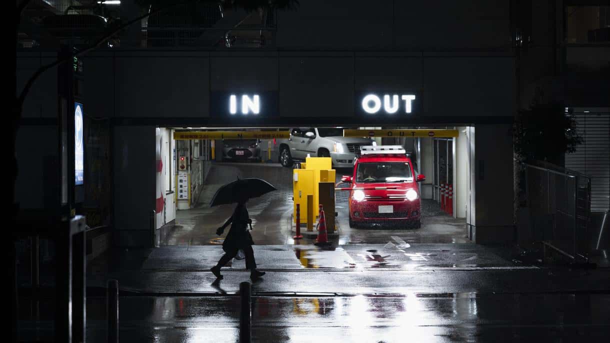 Compact car in a narrow parking lot in the center of New York